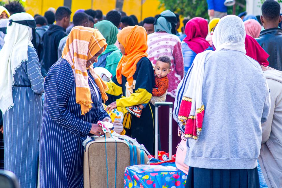 Ethiopian migrants prepare to fly to Addis Ababa from Sana’a on IOM’s Voluntary Humanitarian Return flight. Photo: Rami Ibrahim/IOM Yemen 2022
