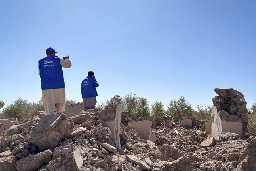 IOM staff documenting the damage caused by the deadly earthquakes in Afghanistan. Photo: IOM/Marjan Wafa 