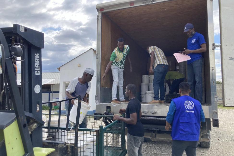 The distribution of clean water is critical to prevent the spread of cholera. Haiti is experiencing its first outbreak of the deadly water-borne disease in more than three years. Photo: IOM