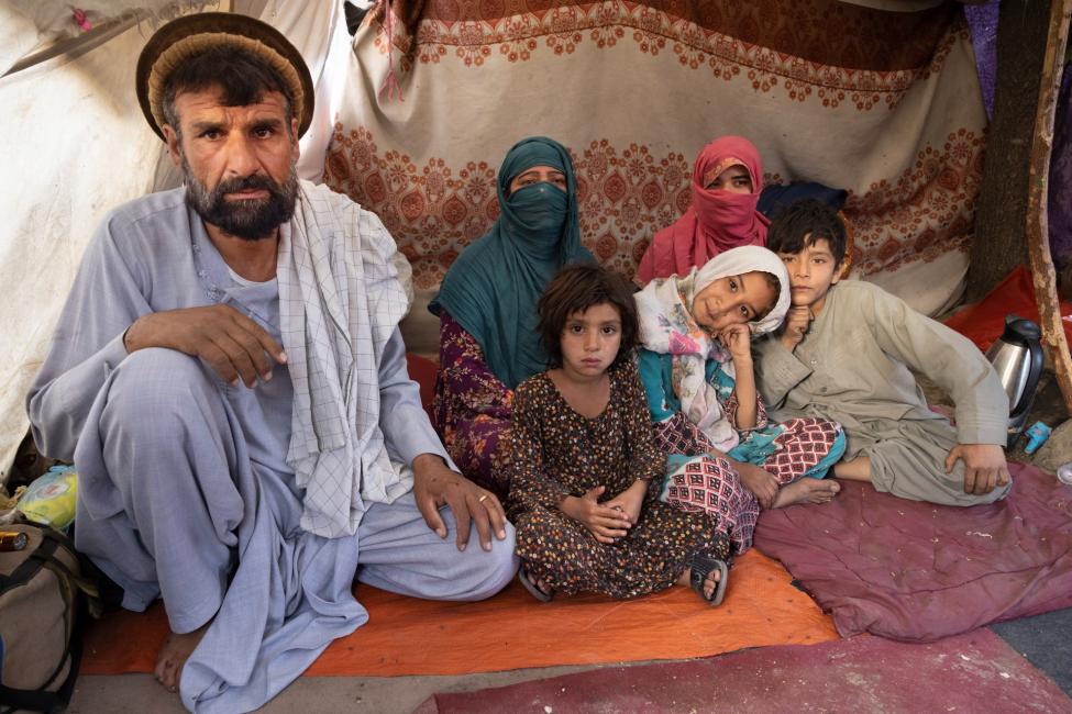Displaced family in an informal site outside of Kabul. Photo: IOM/Bronstein