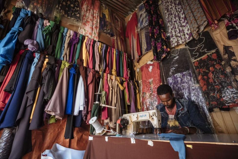Nour Abdi Garaad is a Somali returnee who has set up a garment shop. Returning migrants to East and the Horn of Africa like him face difficulties returning and re-integrating back home, which the new agreements seek to address. Ministers agreed on the need to include such migrants in all national development plans. Photo: IOM/Mohammed Muse