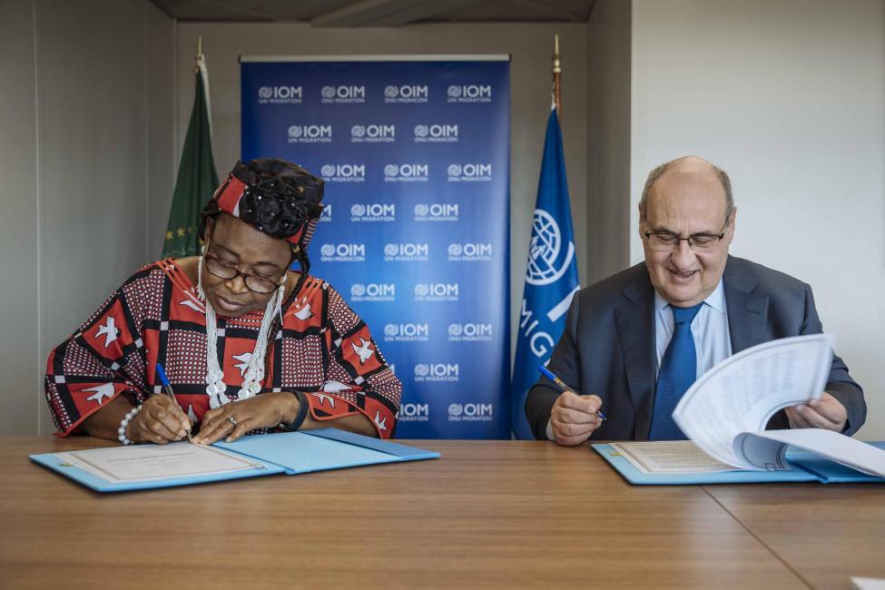 IOM Director General and the Commissioner for Health, Humanitarian Affairs and Social Development at the African Union Commission during the signing of a 3-year partnership agreement. Photo: IOM 