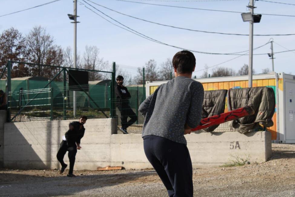 Now sheltered for winter, migrants from Pakistan enjoy a game of cricket at the new Lipa migrant centre. Photo: IOM BiH 